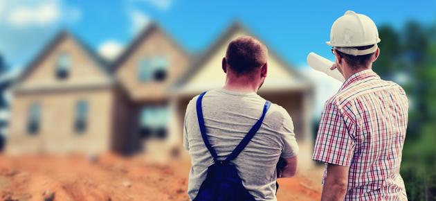 Engineers looking at a house